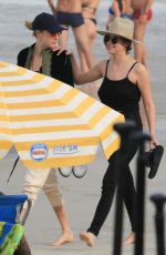 ASHLEY BENSON and CARA DELEVINGNE Out on Copacabana Beach in Rio De Janeiro 01/04/2020