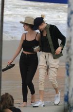 ASHLEY BENSON and CARA DELEVINGNE Out on Copacabana Beach in Rio De Janeiro 01/04/2020