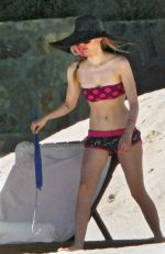 AVRIL LAVIGNE in Bikii at a Beach in Los Cabos 01/13/2011