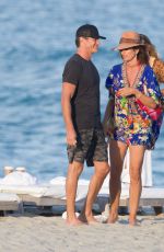 CINDY CRAWFORD and Rande Gerber Out on the Beach in Miami 01/03/2020