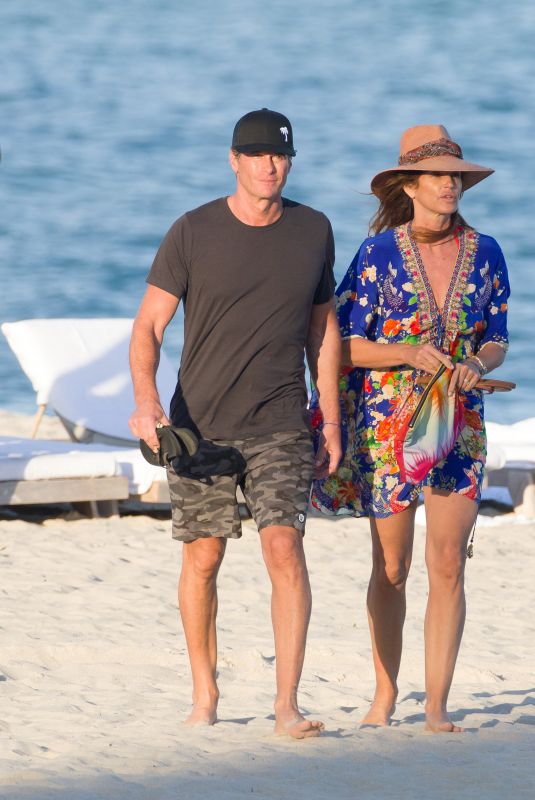 CINDY CRAWFORD and Rande Gerber Out on the Beach in Miami 01/03/2020
