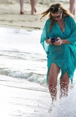 CLAIRE SWEENEY in Bikini at a Beach in Barbados 01/13/2020