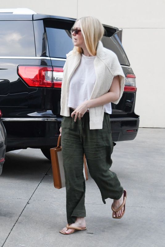 DAKOTA FANNING Out Shopping in Beverly Hills 01/04/2020