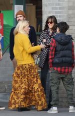 DAKOTA JOHNSON and BUSY PHILIPPS at Larchmont Village in Los Angeles 01/16/2020