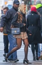 DUA LIPA in a Burberry Mini Skirt and Versace Shoes Out in New York 01/16/2020