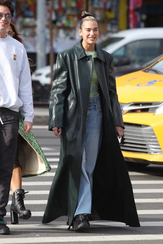 DUA LIPA in a Long Black Leather Trench Coat Out in New York 01/11/2020