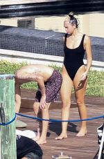 DUA LIPA in Swimsuit at Jet-ski Ride in Miami 01/03/2020