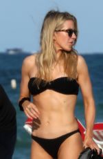 ELLIE GOULDING in a Black Bikini on the Beach in Miami 01/02/2020