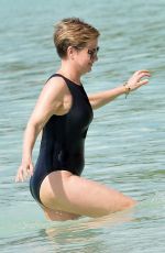 EMMA FORBES in a Black Swimsuit at a Beach in Barbados 01/01/2020