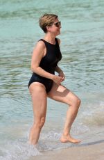 EMMA FORBES in a Black Swimsuit at a Beach in Barbados 01/01/2020