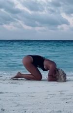 ILARY BLASI in Swismuit Doing Yoga at a Beach in Maldives 01/07/2020