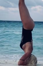 ILARY BLASI in Swismuit Doing Yoga at a Beach in Maldives 01/07/2020