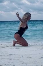 ILARY BLASI in Swismuit Doing Yoga at a Beach in Maldives 01/07/2020