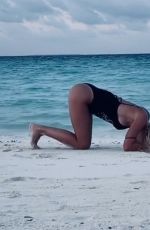 ILARY BLASI in Swismuit Doing Yoga at a Beach in Maldives 01/07/2020