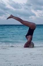 ILARY BLASI in Swismuit Doing Yoga at a Beach in Maldives 01/07/2020