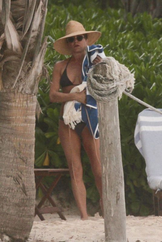 JENNIFER ANISTON in Bikini at a Beach in Tulum 01/01/2020