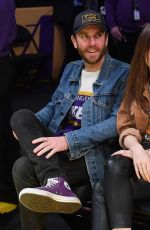 LILY COLLINS and Charlie McDowell at Cleveland Cavaliers vs LA Lakers Game in Los Angeles 01/13/2020