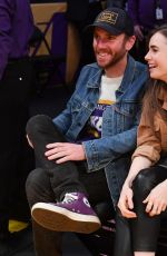 LILY COLLINS and Charlie McDowell at Cleveland Cavaliers vs LA Lakers Game in Los Angeles 01/13/2020