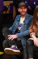 LILY COLLINS and Charlie McDowell at Cleveland Cavaliers vs LA Lakers Game in Los Angeles 01/13/2020