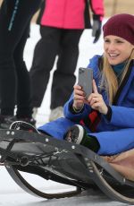 MICHELLE HUNZIKER on the Dog Sled in Sauris 01/25/2020