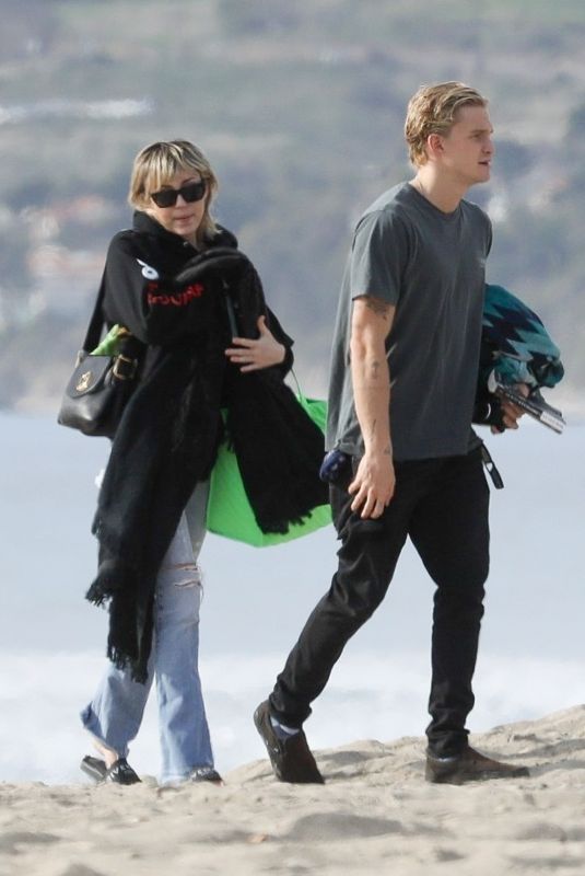 MILEY CYRUS and Cody Simpson at Malibu Beach 01/22/2020