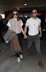 ROSE LESLIE and Kit Harington at LAX Airport in Los Angeles 01/06/2020
