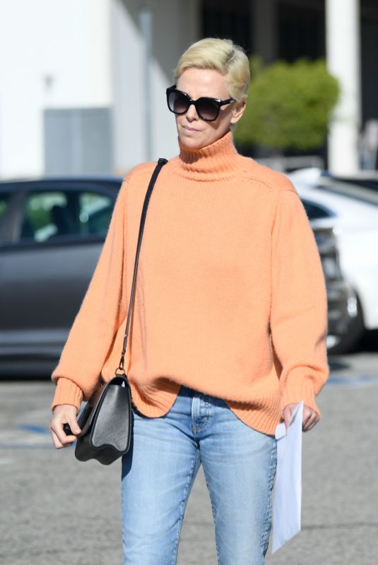 CHARLIZE THERON in Denim Out and About in Los Angeles 02/25/2020