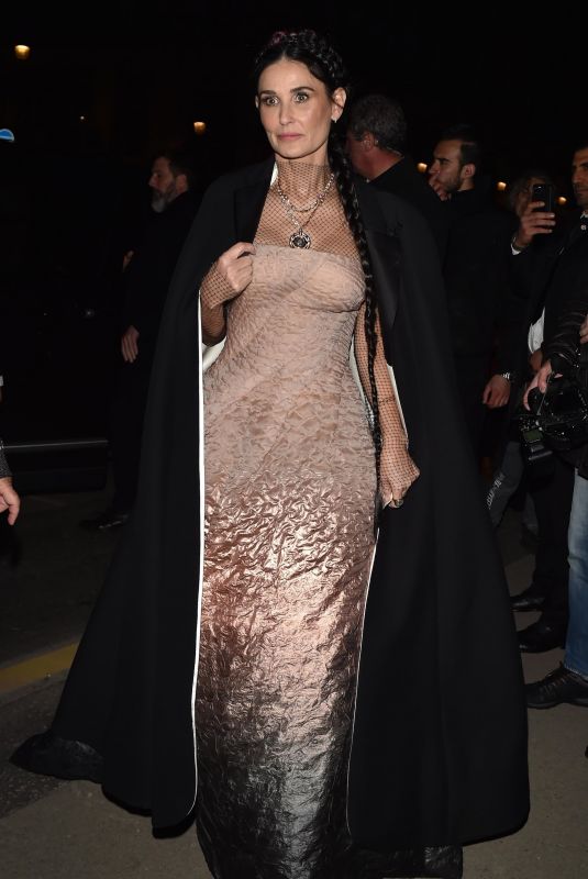 DEMI MOORE Arrives at Harper