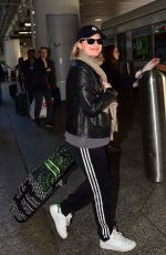 ELISABETH MOSS Arrives at LAX Airport in Los Angeles 02/23/2020