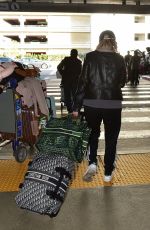 ELISABETH MOSS Arrives at LAX Airport in Los Angeles 02/23/2020