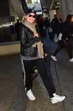 ELISABETH MOSS Arrives at LAX Airport in Los Angeles 02/23/2020