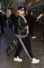 ELISABETH MOSS Arrives at LAX Airport in Los Angeles 02/23/2020