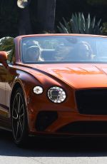 HEIDI KLUM and Tom Kaulitz Driving Out in Their Bentleyt Convertible 02/16/2020