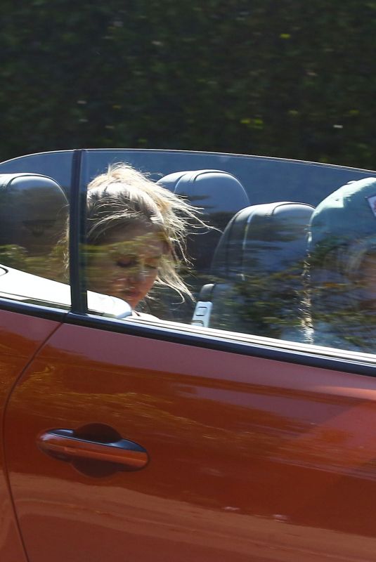 HEIDI KLUM and Tom Kaulitz Driving Out in Their Bentleyt Convertible 02/16/2020