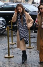 LILY COLLINS Out and About in Paris 02/25/2020