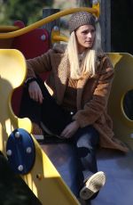 MICHELLE HUNZIKER Out with Her Dogs at a Park in Milano 02/06/2020