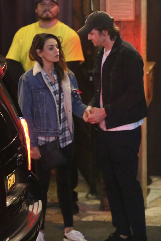 MILA KUNIS and Ashton Kutcher at Saddle Ranch in West Hollywood 02/26/2020