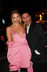 NATASHA POLY Arrives at Harper