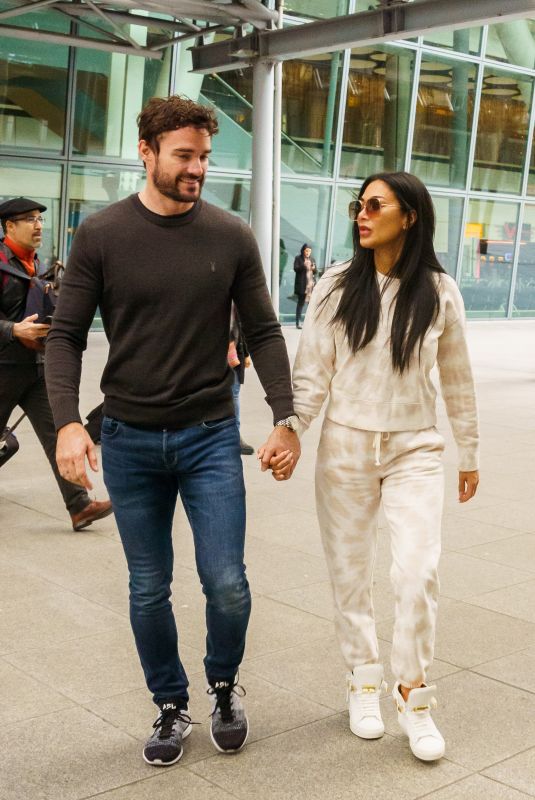 NICOLE SCHERZINGER and Tom Evans Arrives in London 02/21/2020