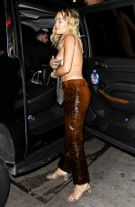 RITA ORA in Backless Sequin Top and Leather Pants Arrives at Chateau Marmont in West Hollywood 02/26/2020