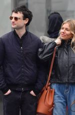 SIENNA MILLER and Tom Sturridge Out with Their Dog in New York 02/26/2020