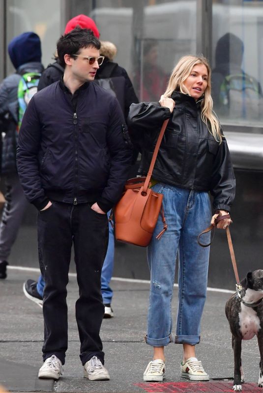 SIENNA MILLER and Tom Sturridge Out with Their Dog in New York 02/26/2020
