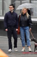 SIENNA MILLER and Tom Sturridge Out with Their Dog in New York 02/26/2020