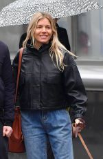 SIENNA MILLER and Tom Sturridge Out with Their Dog in New York 02/26/2020