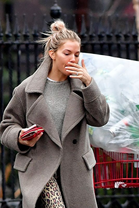 SIENNA MILLER Shows off Her Engagement Ring Out in New York 02/11/2020
