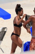 TINA KUNAKEY in Bikini on the Beach in Rio De Janeiro 02/24/2020