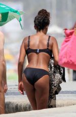 TINA KUNAKEY in Bikini on the Beach in Rio De Janeiro 02/24/2020