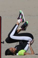 WINNIE HARLOW at a Photoshoot on the Beach in Los Angeles 01/29/2020