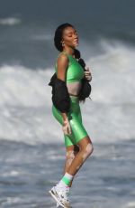 WINNIE HARLOW at a Photoshoot on the Beach in Los Angeles 01/29/2020