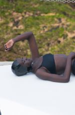 ADUT AKECH in Bikini at a Photoshoot at Bondi Icebergs Pool 12/13/2020